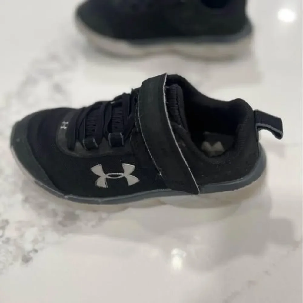 12K Shoes Sneakers black silver some wear toddler Under Armour tennis shoes